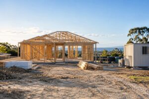 Guide to Building a Home in Sydney - a residential building site with timber frame and a site shed